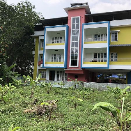 En Jays Residency Apartman Kottajam Kültér fotó