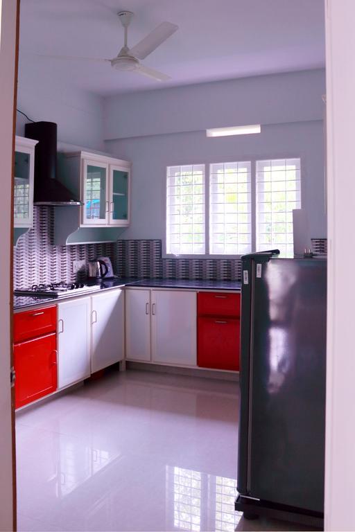 En Jays Residency Apartman Kottajam Kültér fotó