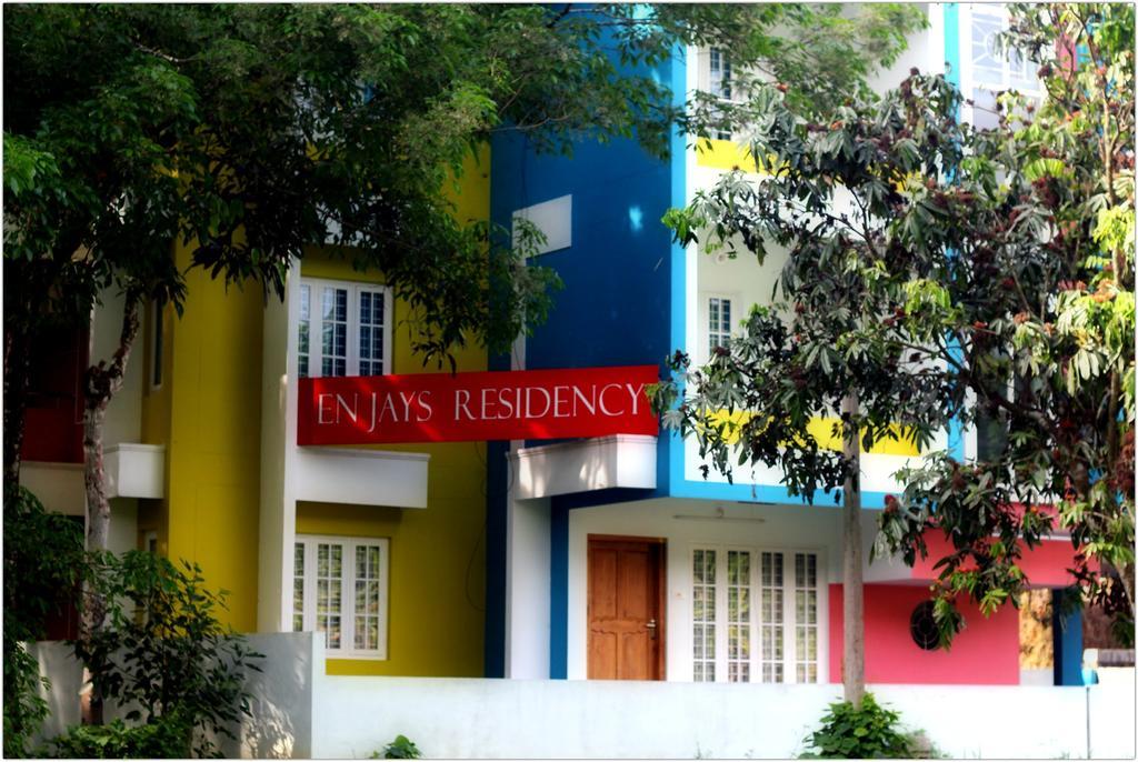 En Jays Residency Apartman Kottajam Kültér fotó