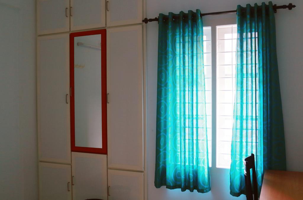 En Jays Residency Apartman Kottajam Kültér fotó