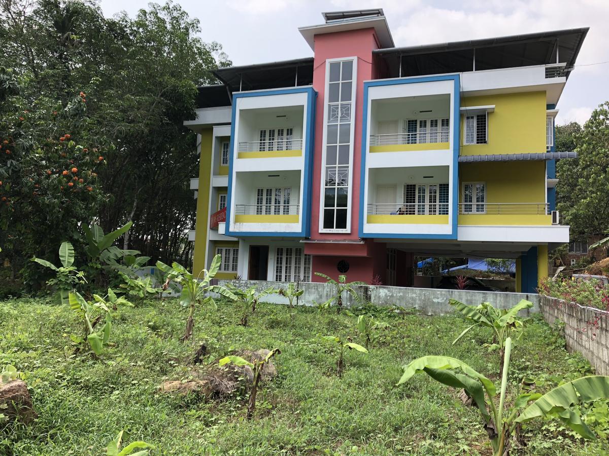 En Jays Residency Apartman Kottajam Kültér fotó